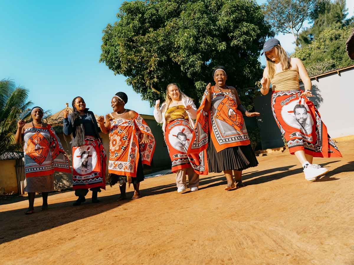 Travelers Dancing With Locals In South Africa