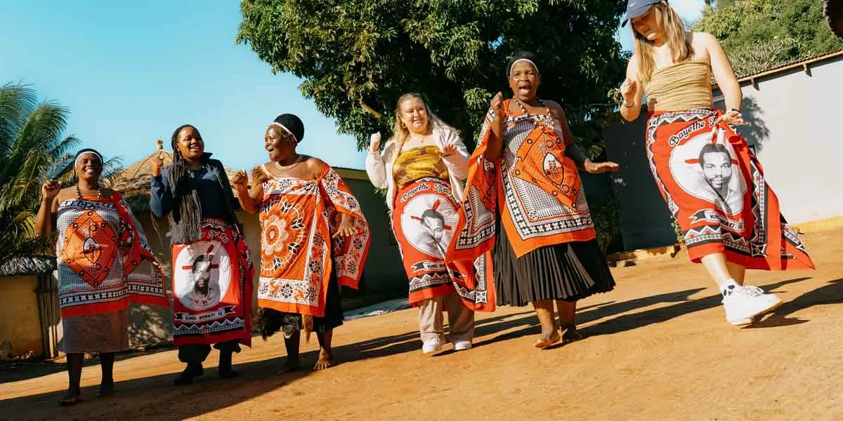 Travelers Dancing With Locals In South Africa
