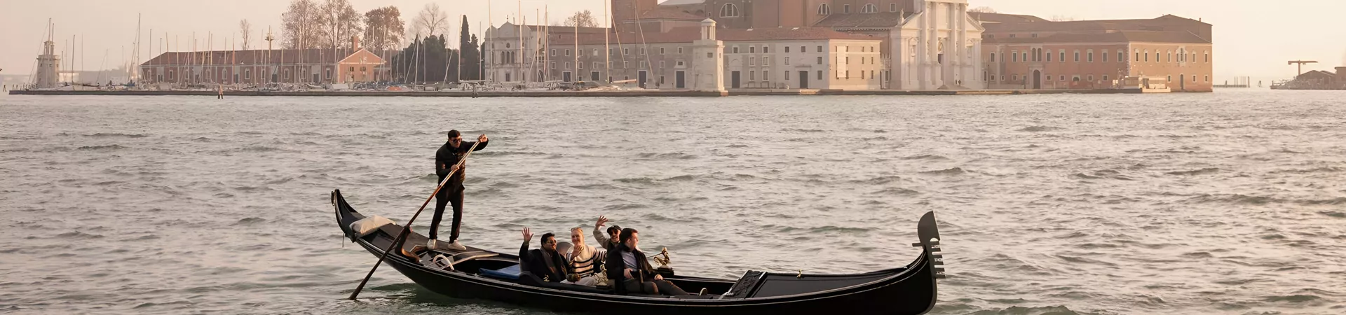 People Enjoying A Boat Trip Saying Hello To The Camera Hp