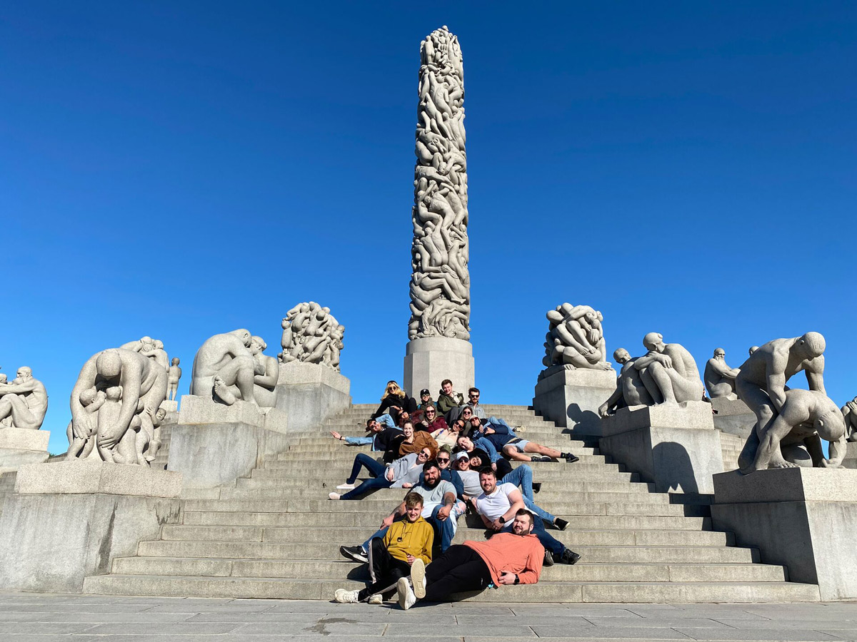 Large Group Of Friends Visiting A Landmark Sunny Day