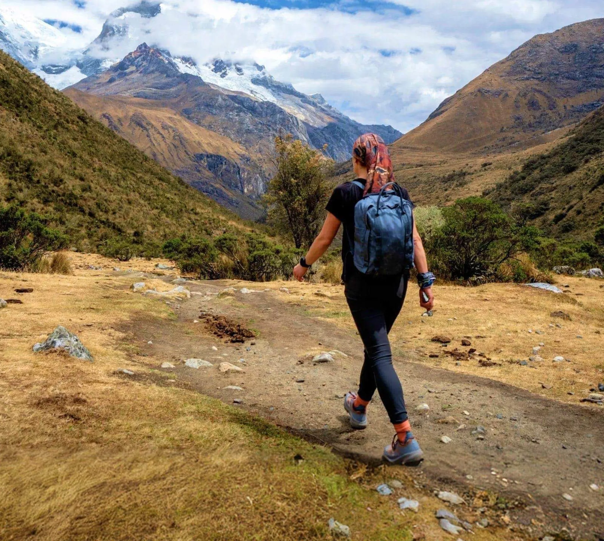 Traveller hiking through the Andes near Huaraz, Peru, on the Contiki Active Peru: Lima to Huaraz Tour