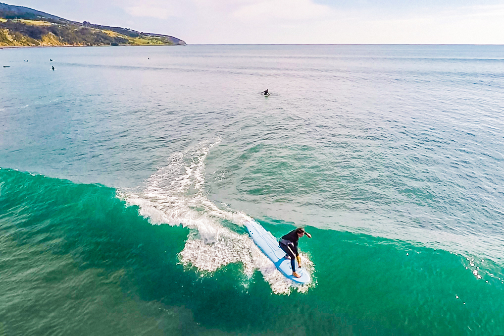 Surfer Riding A Wave