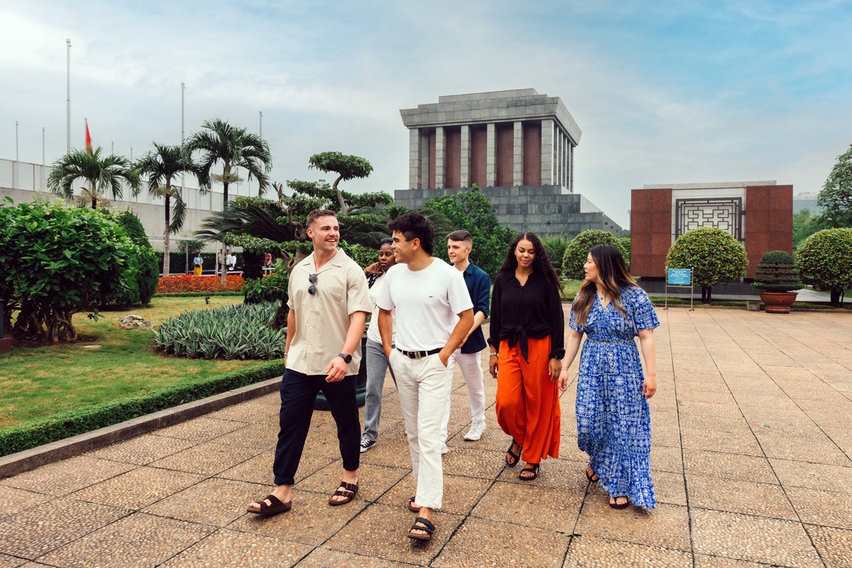 Group Walking Through Ho Chi Minh