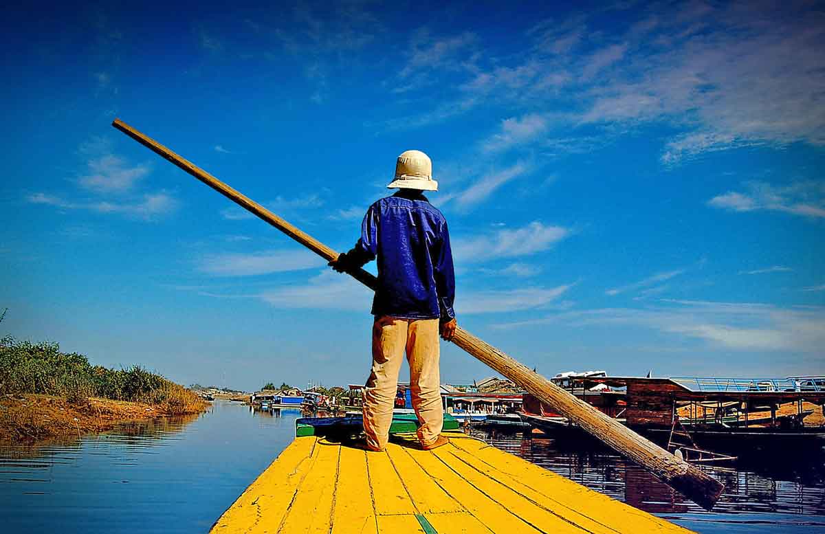 Local sailing in river, Cambodia