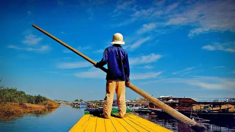 Local sailing in river, Cambodia