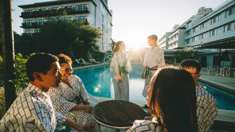group-talking-by-the-pool.jpg