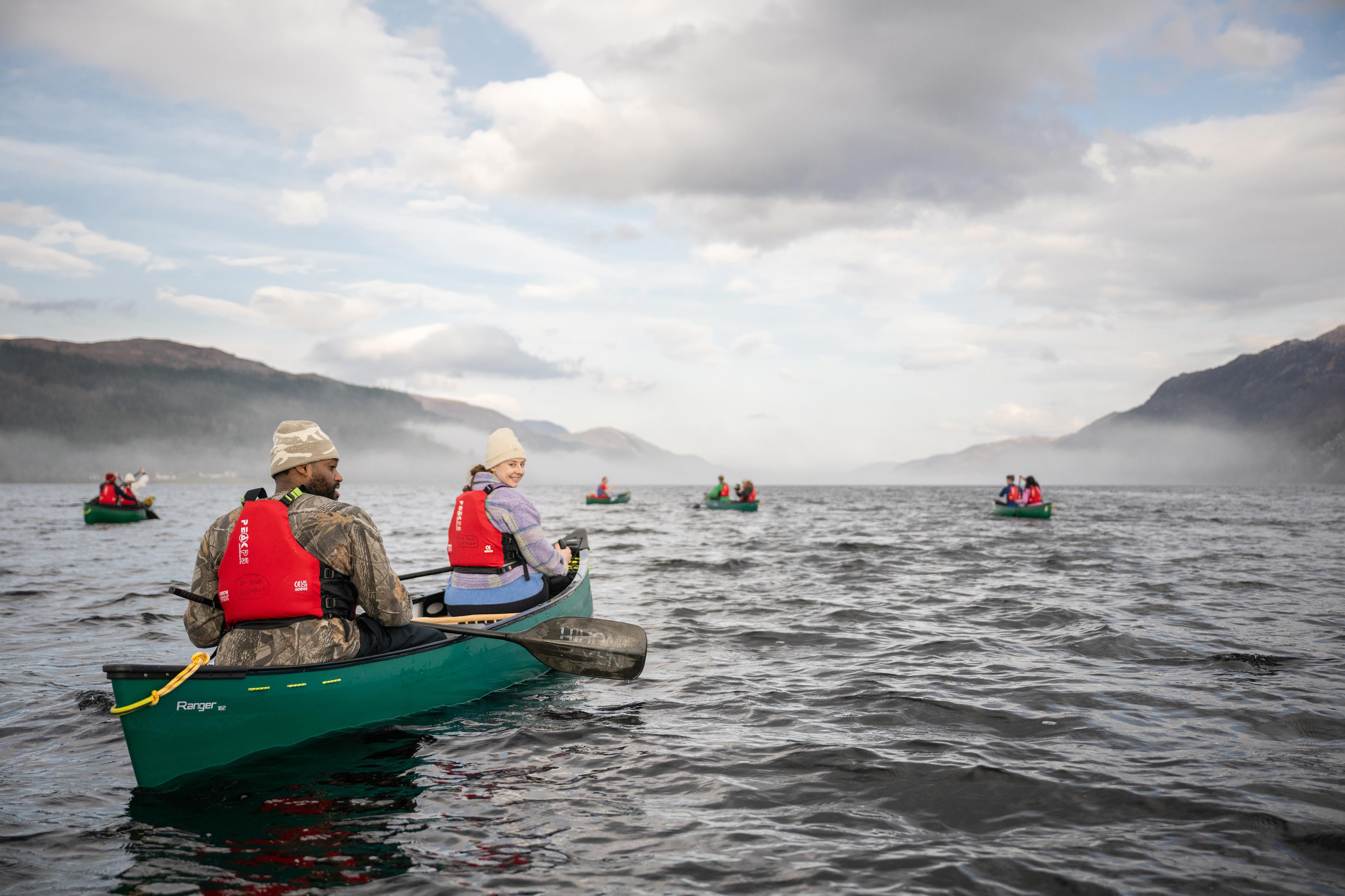 Group Canoeing In Loch Ness