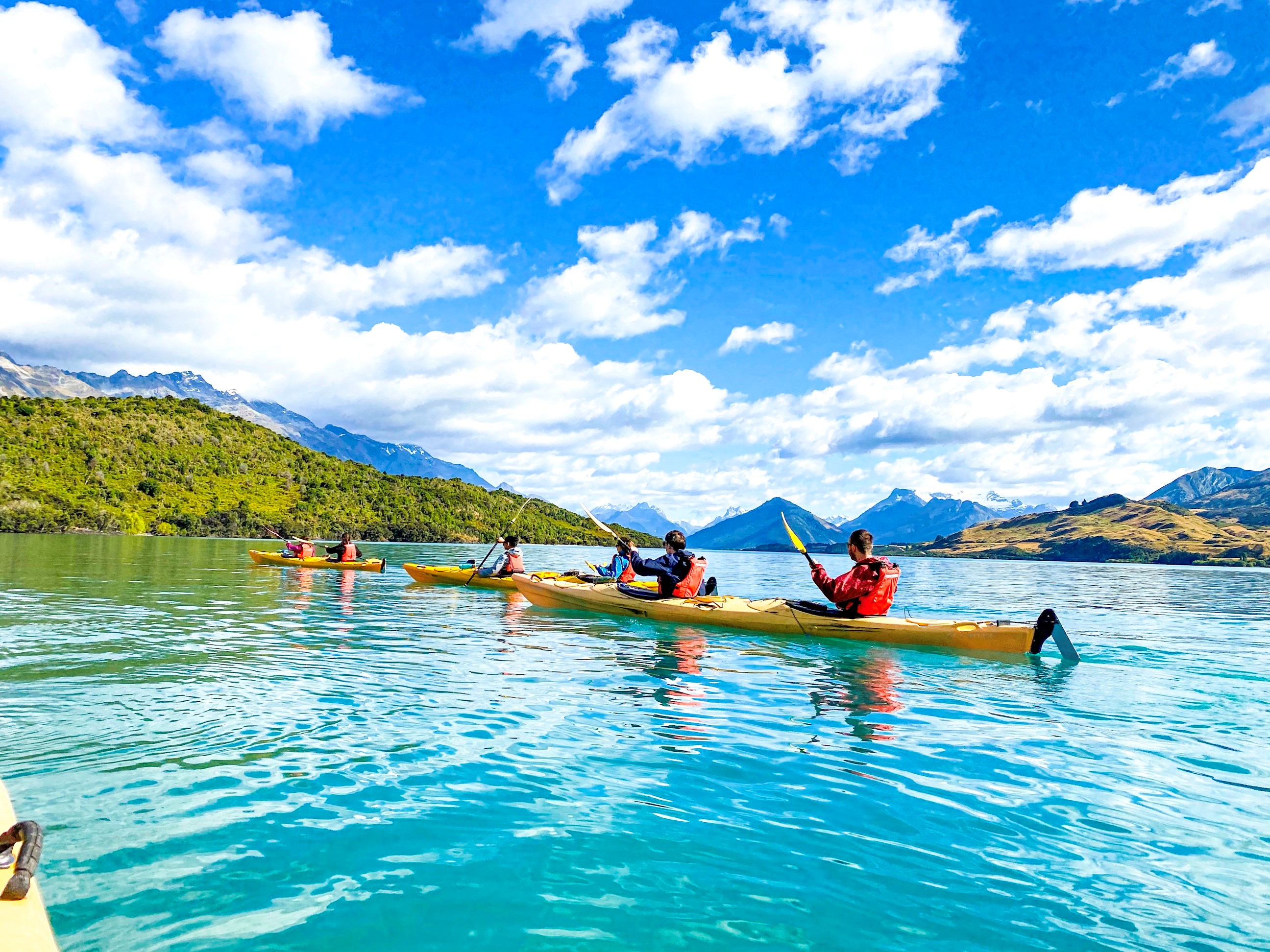 Travellers on kayaks around the Glaciers of Franz Joseph, New Zealand