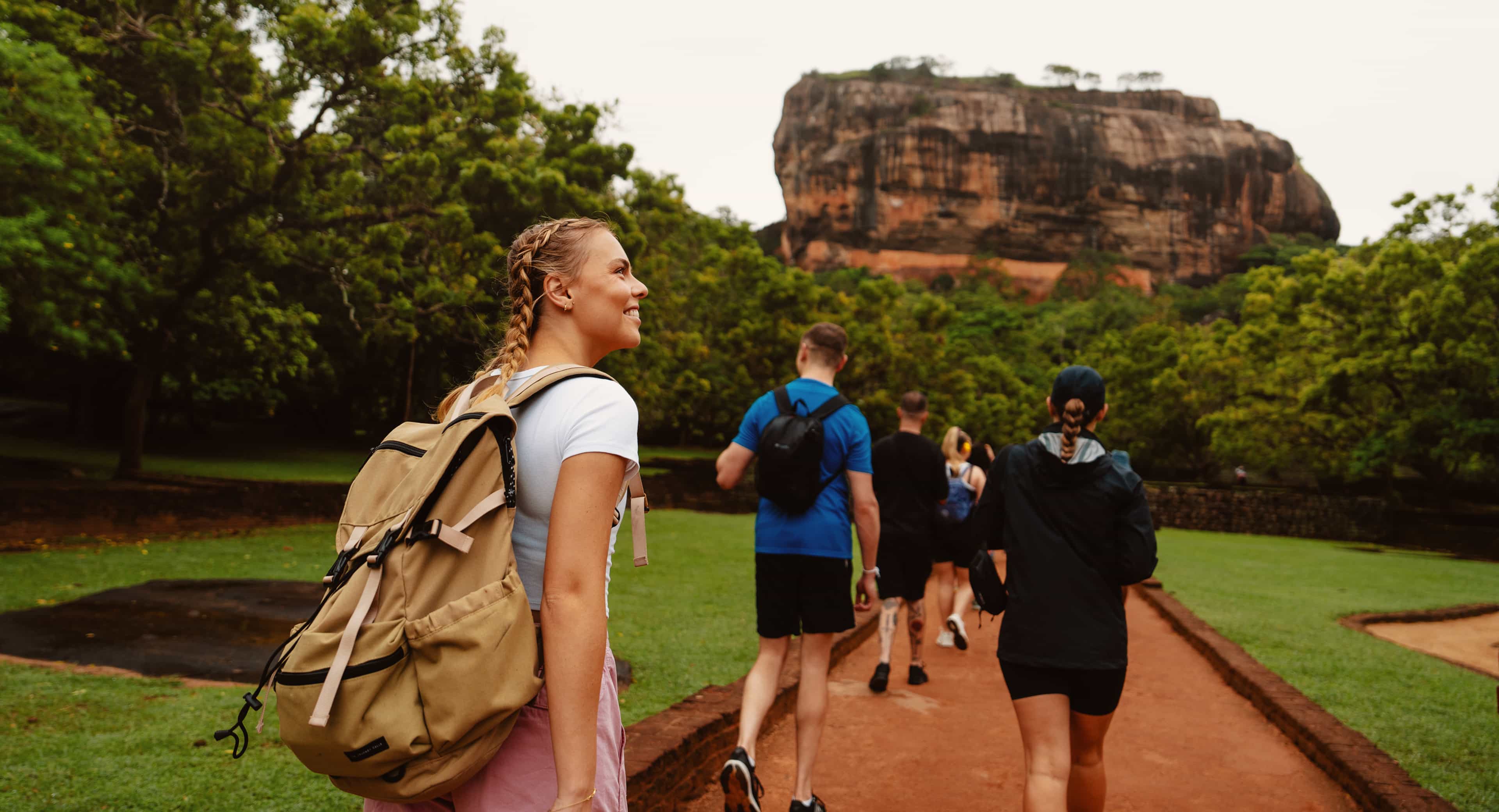 activity-shaylajay-whycontiki-shayla-walking-with-travellers-toward-ancient-sigiriya-rock-fortress-sri-lanka.jpg