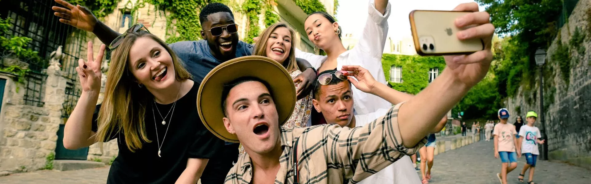 Group of young people taking a selfie in Paris