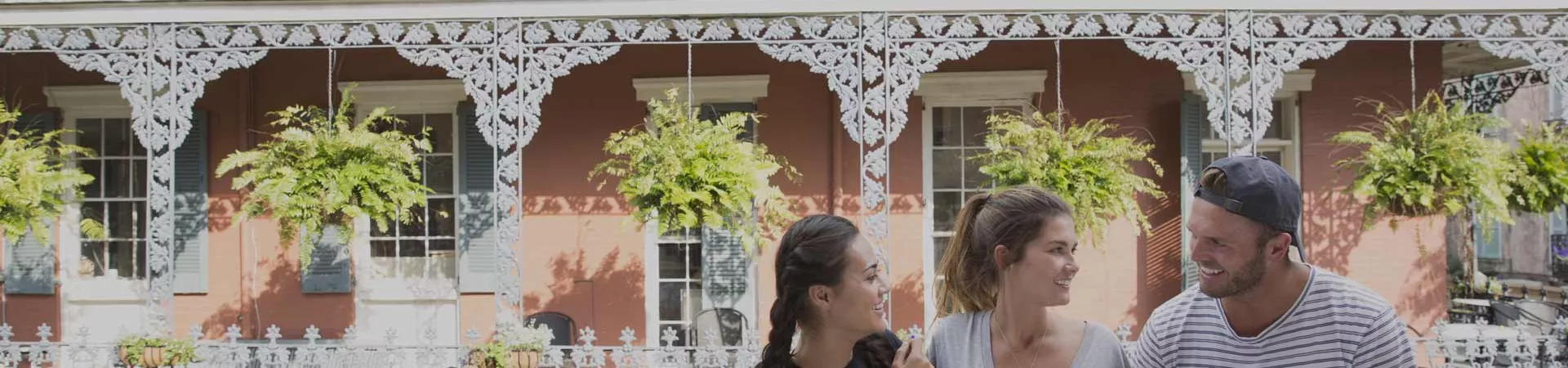 Friends talking at the balcony