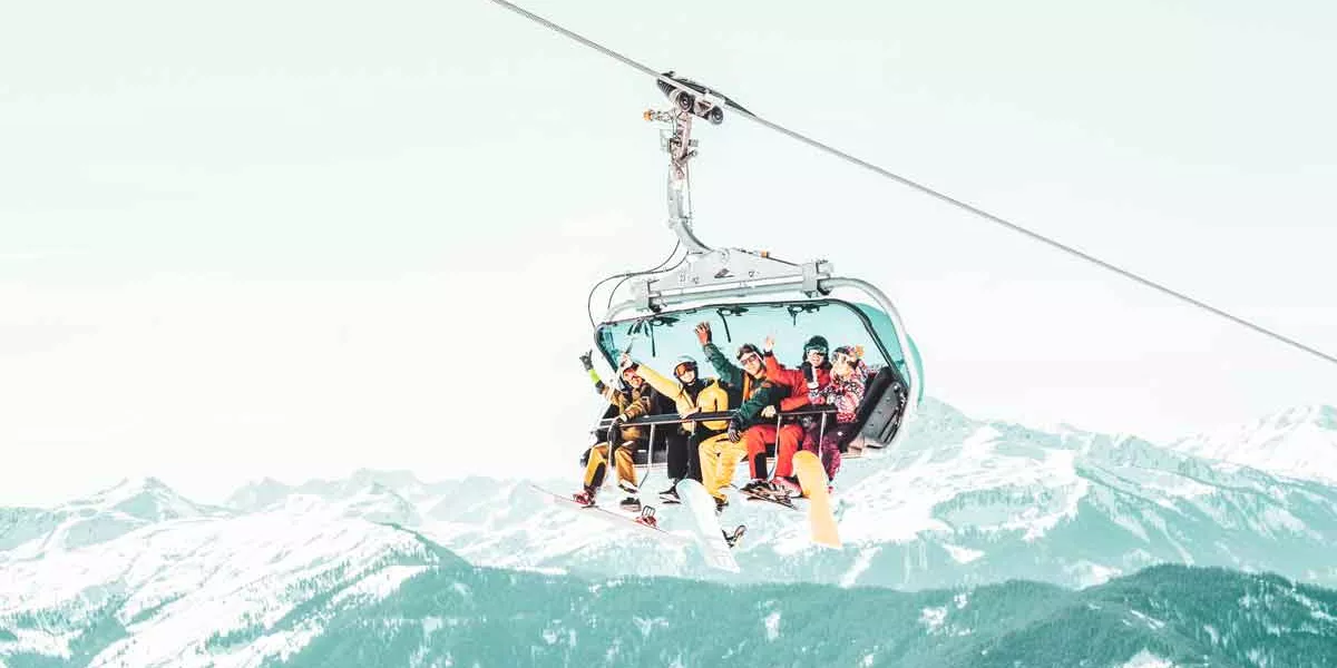 Travelers On Lift In Austria