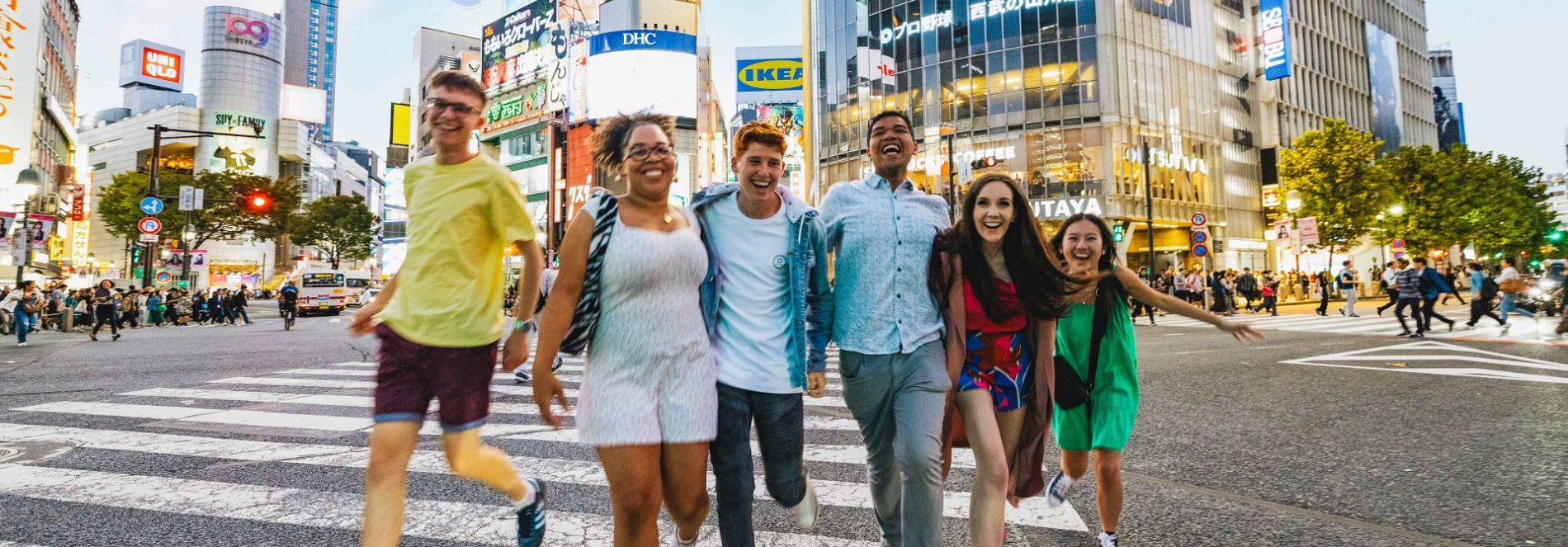 Group of young travelers exploring Tokyo, Japan