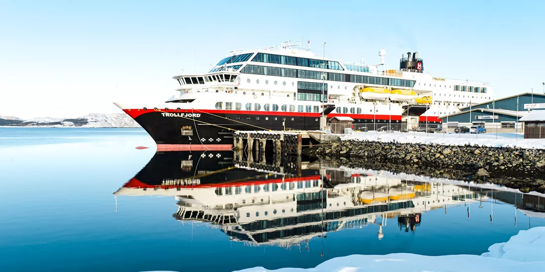 A Hurtigruten ship in the Arctic Circle anchored in Norway