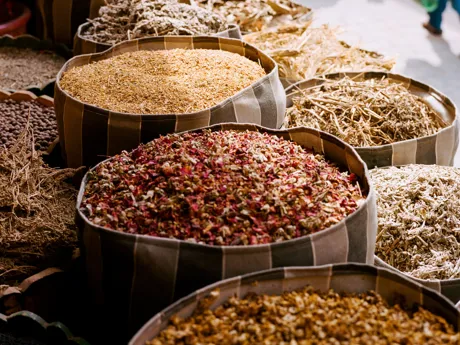 Sacks of dried fruit and seeds on a market stall in Rabat, Morocco