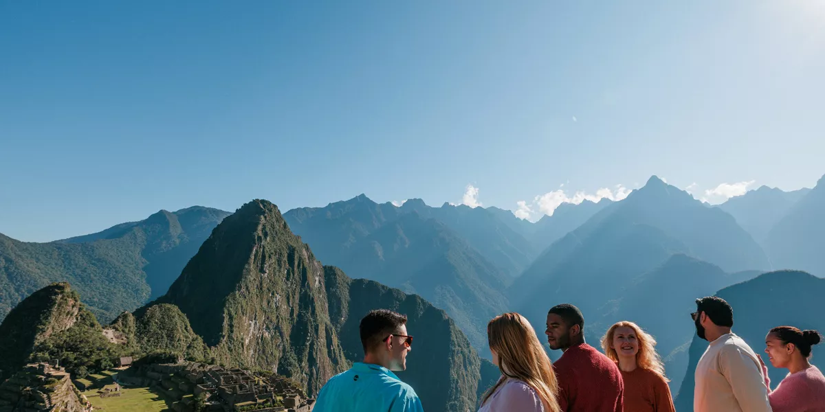 People Talking To Each Other Sorrounded By Nature And Green Mountains