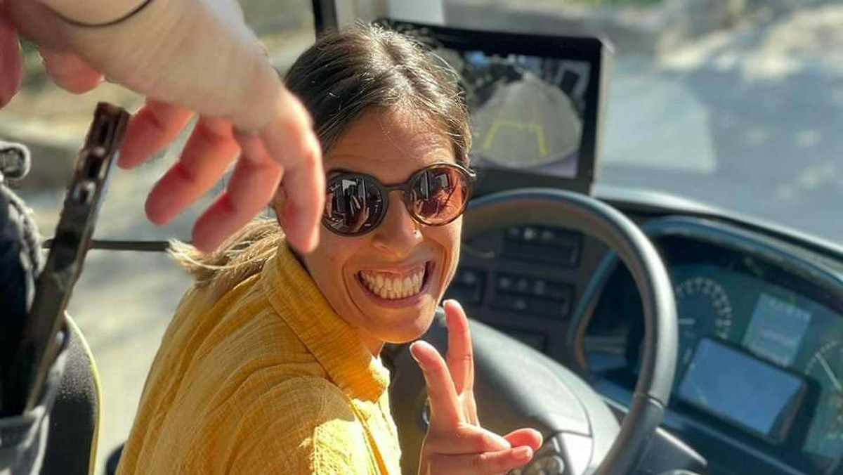 Driver Smiling On Coach