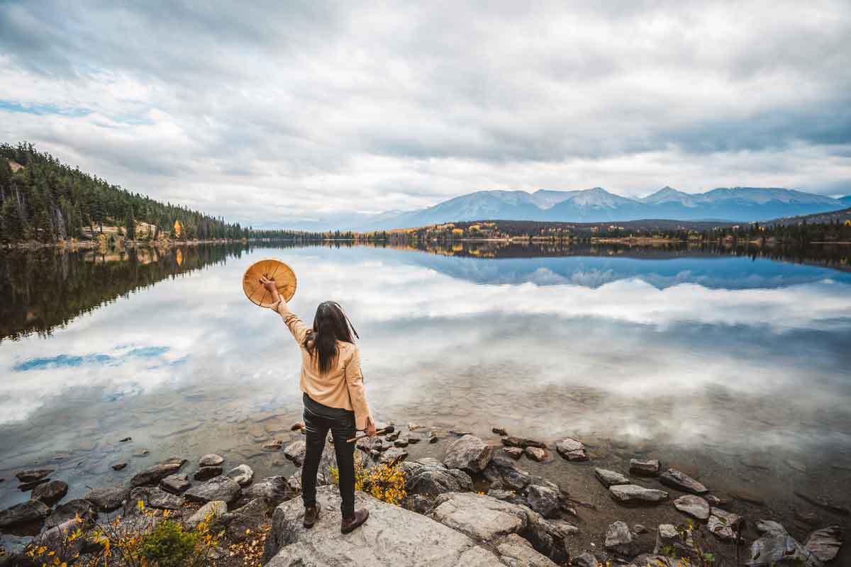 Traveler In Canada Looking Out Over A Lake