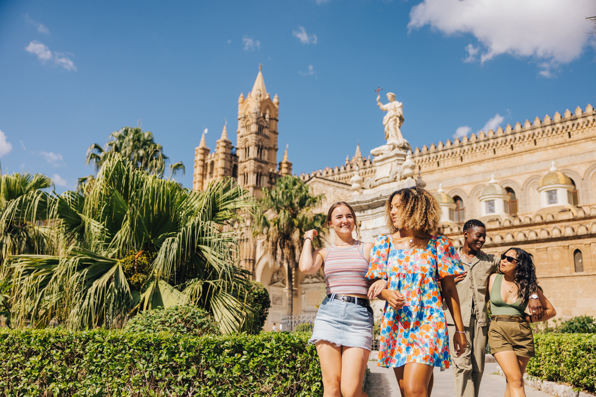 Group Of Friends Walk Through Sicily