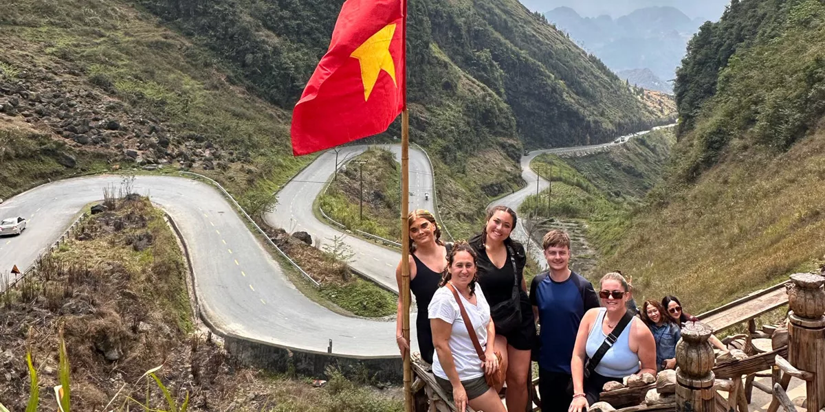 Group Stood Next To Ha Giang Loop