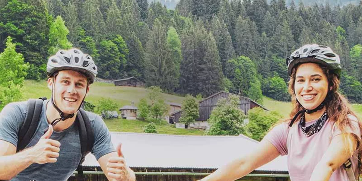 Smilling tourists on bicycles