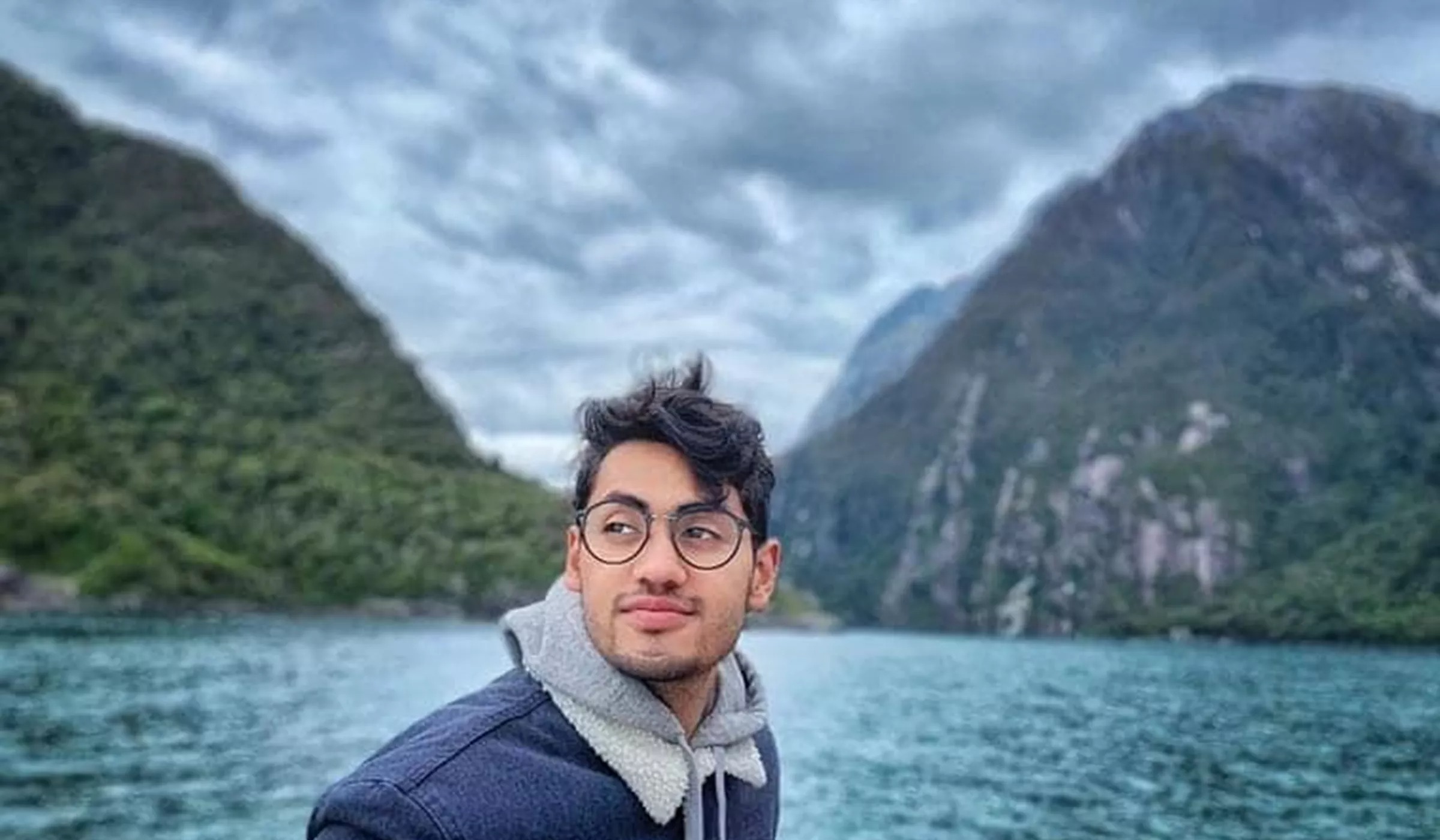Man wearing glasses in New Zealand Milford Sound Cruise