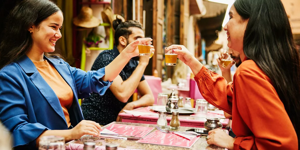 Friends Drinking Tea At A Restaurant