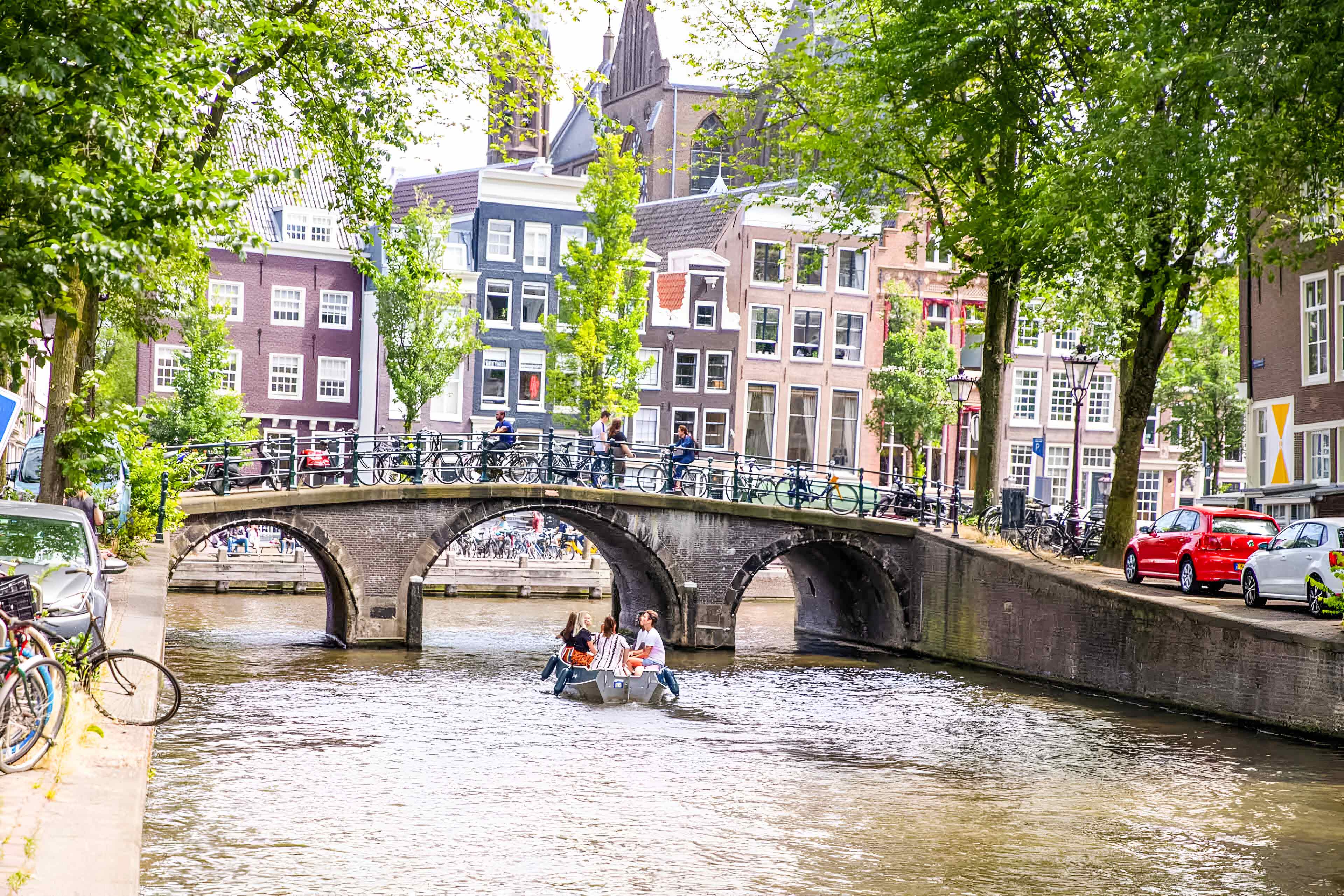 Canal Bridge People On A Boat And Crossing A Bridge
