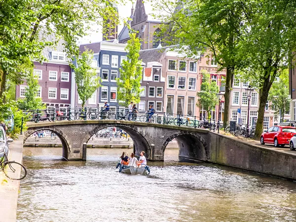 Canal Bridge People On A Boat And Crossing A Bridge