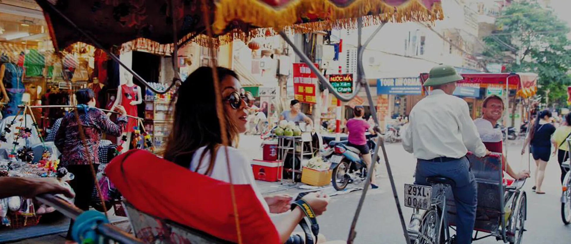 Rickshas on streets of Hanoi in Vietnam