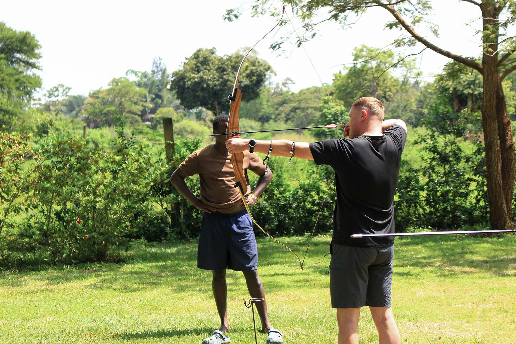 Traveller participating in archery in Sagana, Kenya