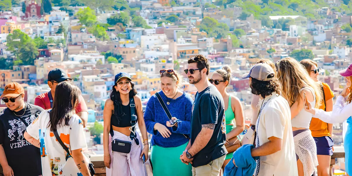 Young People Smiling City At The Background