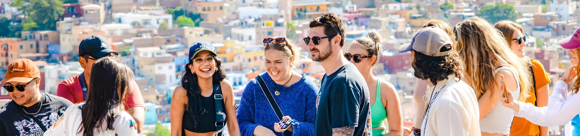 Young People Smiling City At The Background