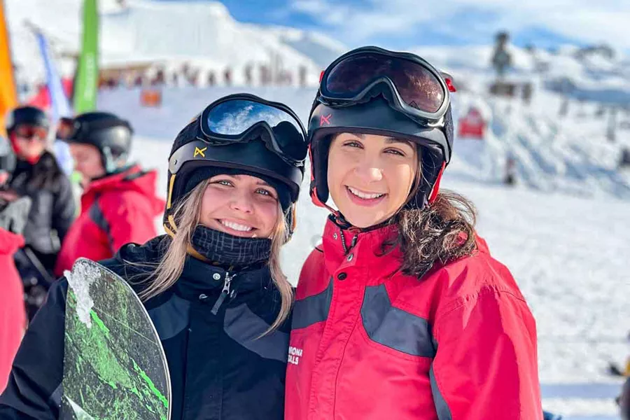 Snowboarders Getting Ready For The Slopes