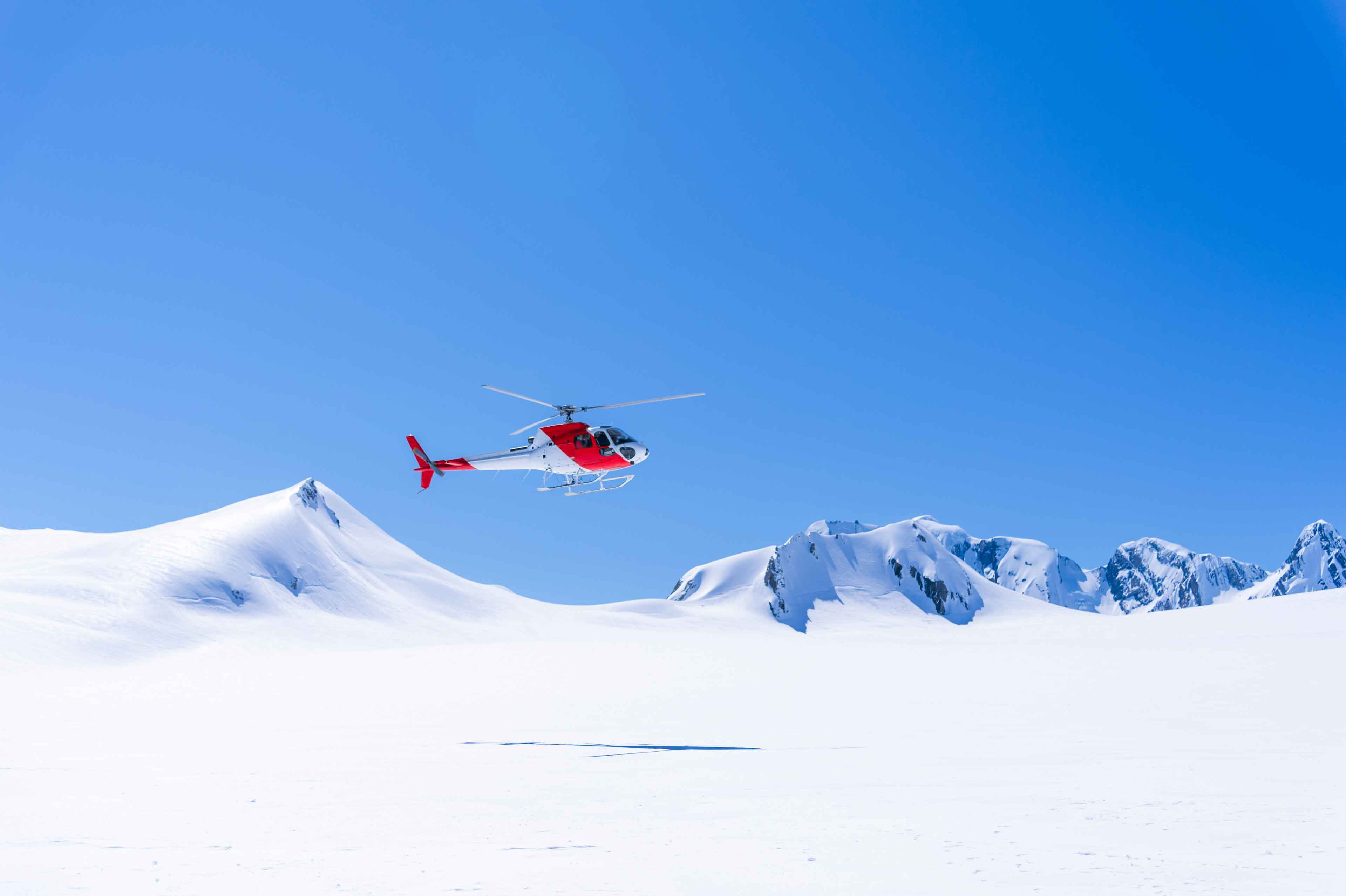 Aerial View Of Helicopter On Snow Mountain In Fox Glacier Town Southern Alps Mountain Valleys New Zealand