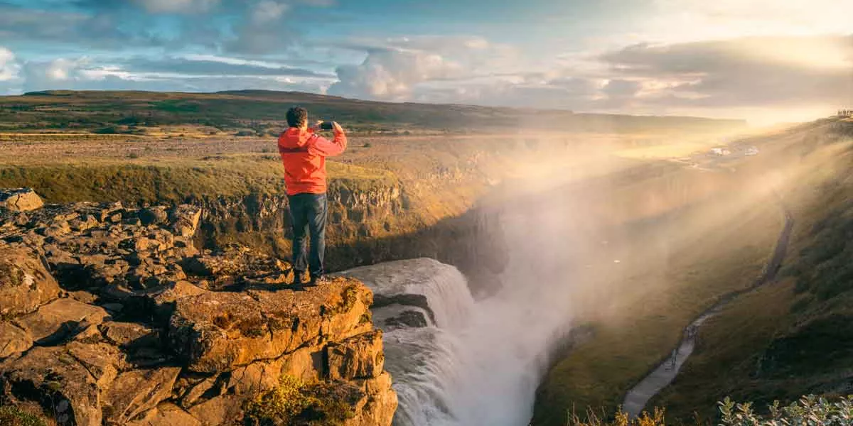 Tourist Looking Out Over View Iceland