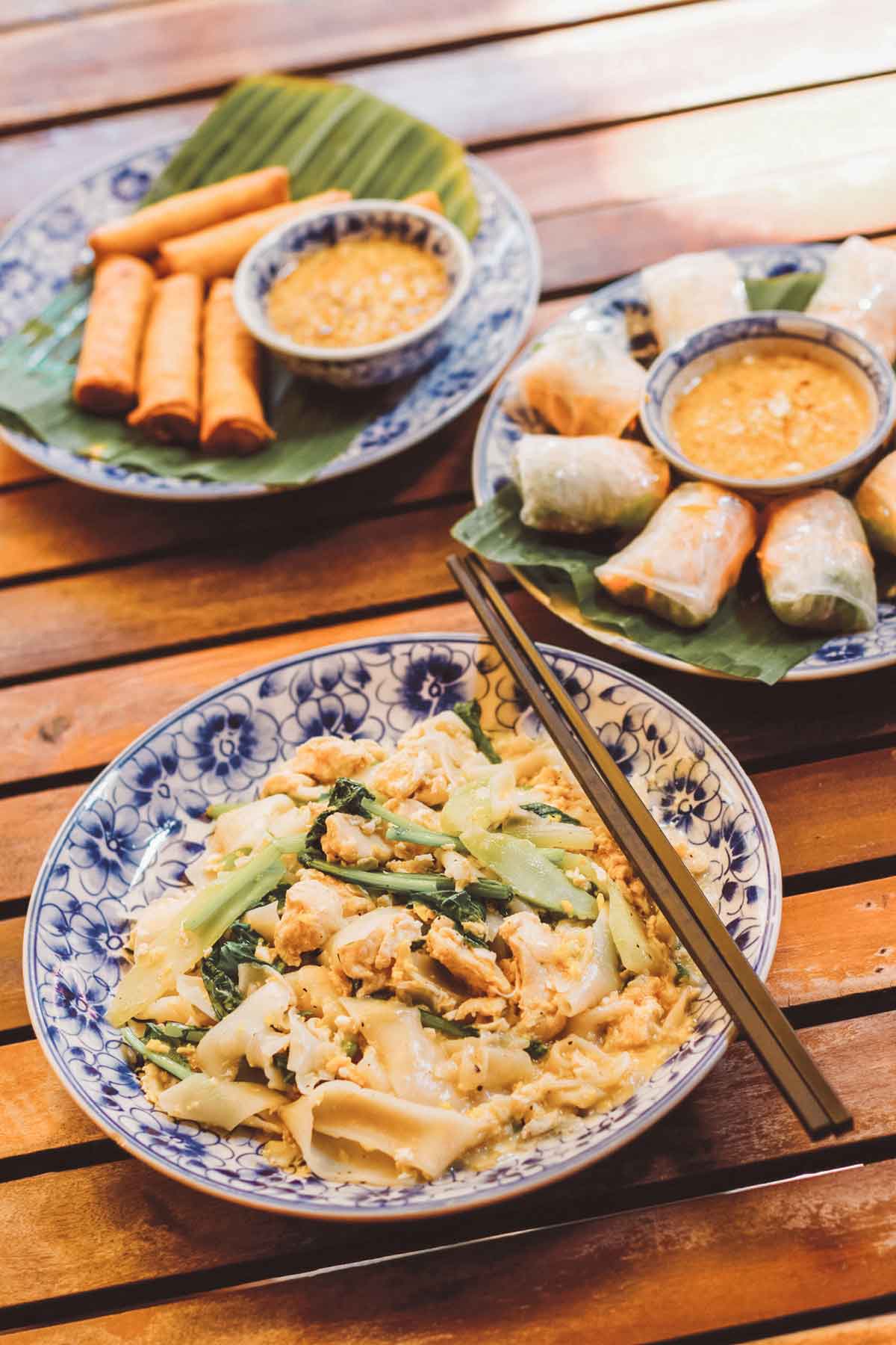 Close up on plates with Cambodian foods
