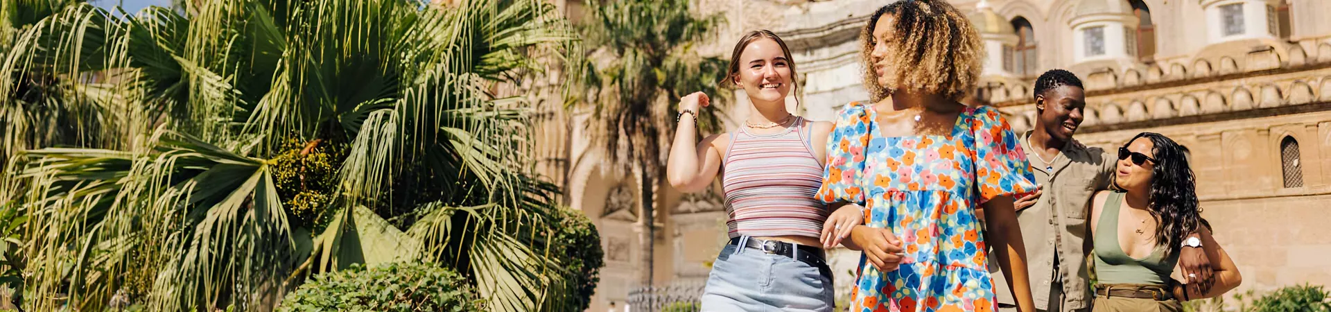 Group Of Friends Walking Italy Landmark Sunny Day