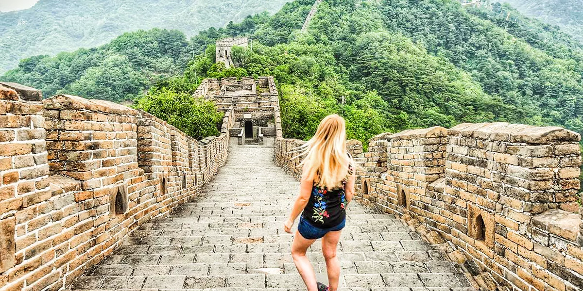 Girl Walking Along Great Wall Of China