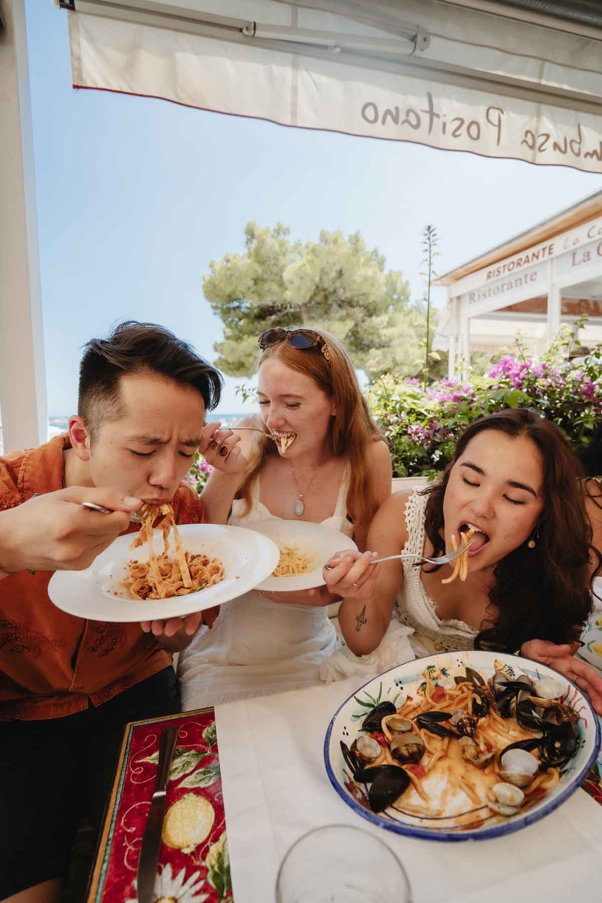 Travelers Enjoying Italian Food In Italy