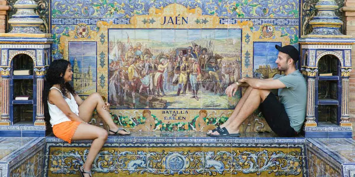 Couple Of Traverlers Sitting On Tiled Area Europe 1025EURS2018