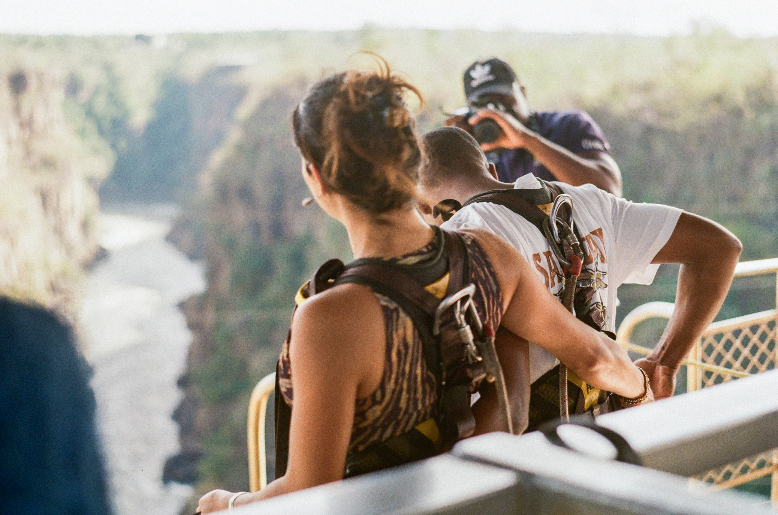 Two travellers preparing for the tandem bridge swing in Victoria Falls, Zambia