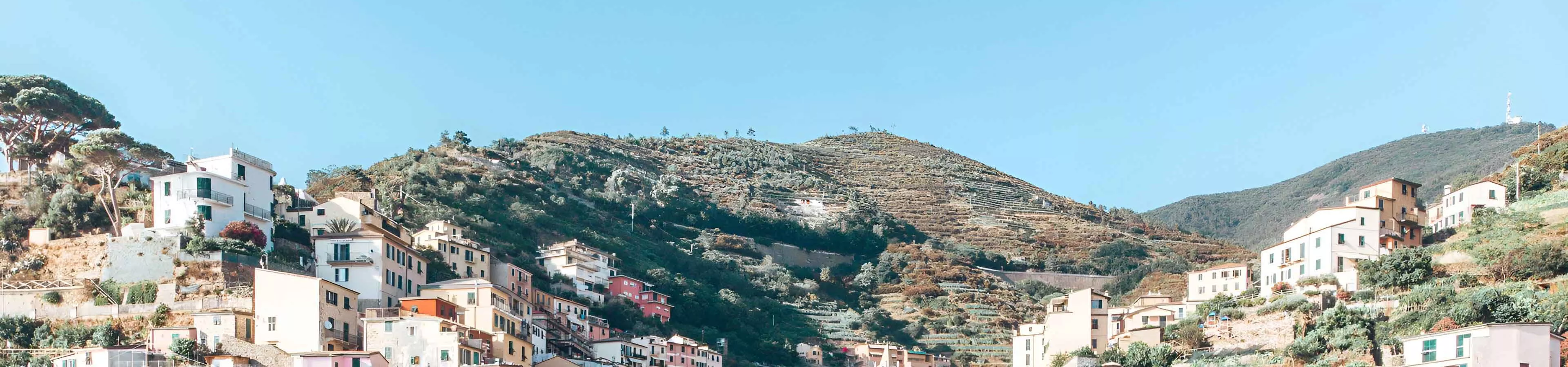 imgi_22_sunny-day-at-cinque-terre-town-from-afar.webp