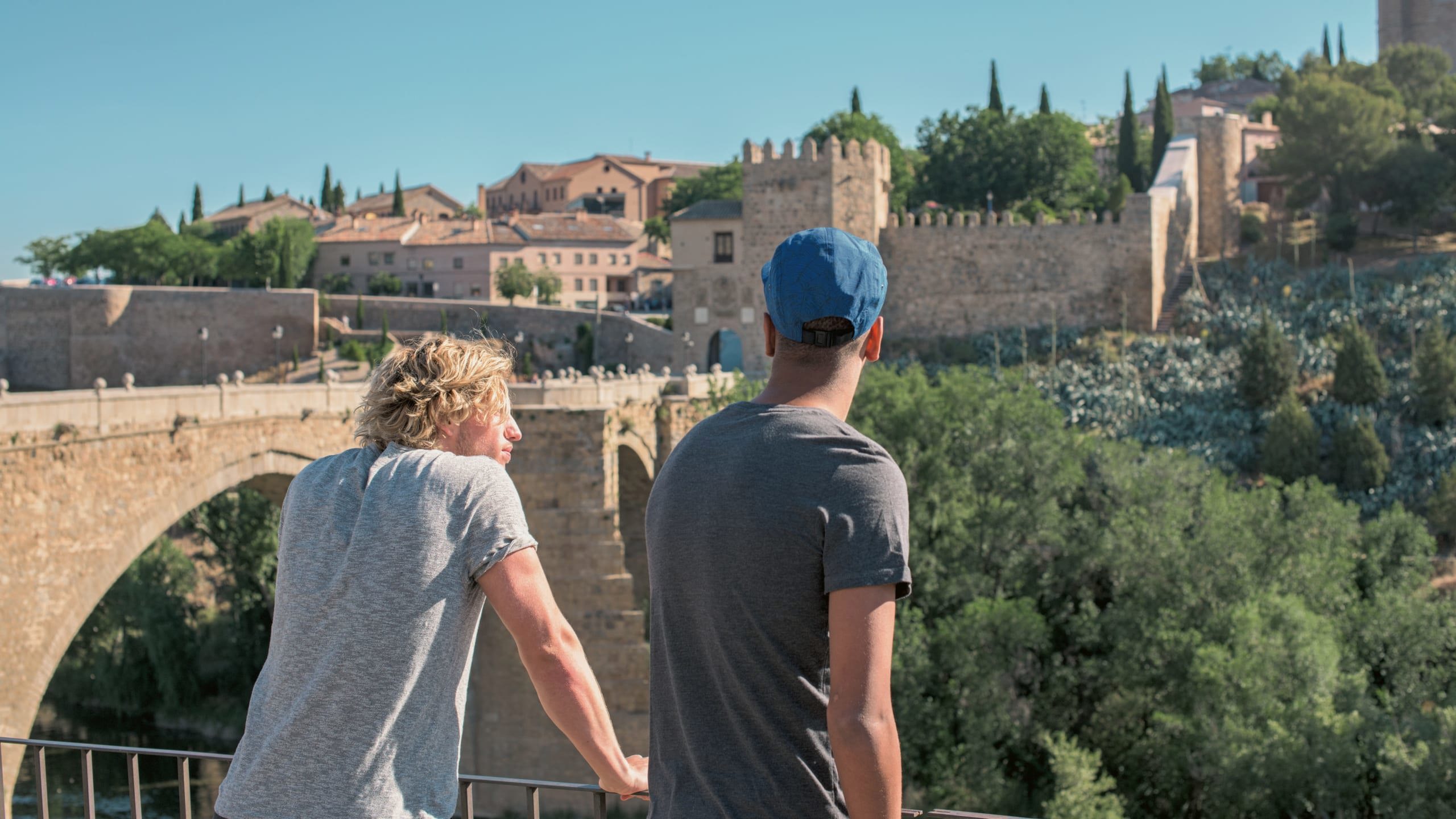 Two people enjoying views of Toledo's medieval old town - Contiki Madrid to Marrakesh Tour