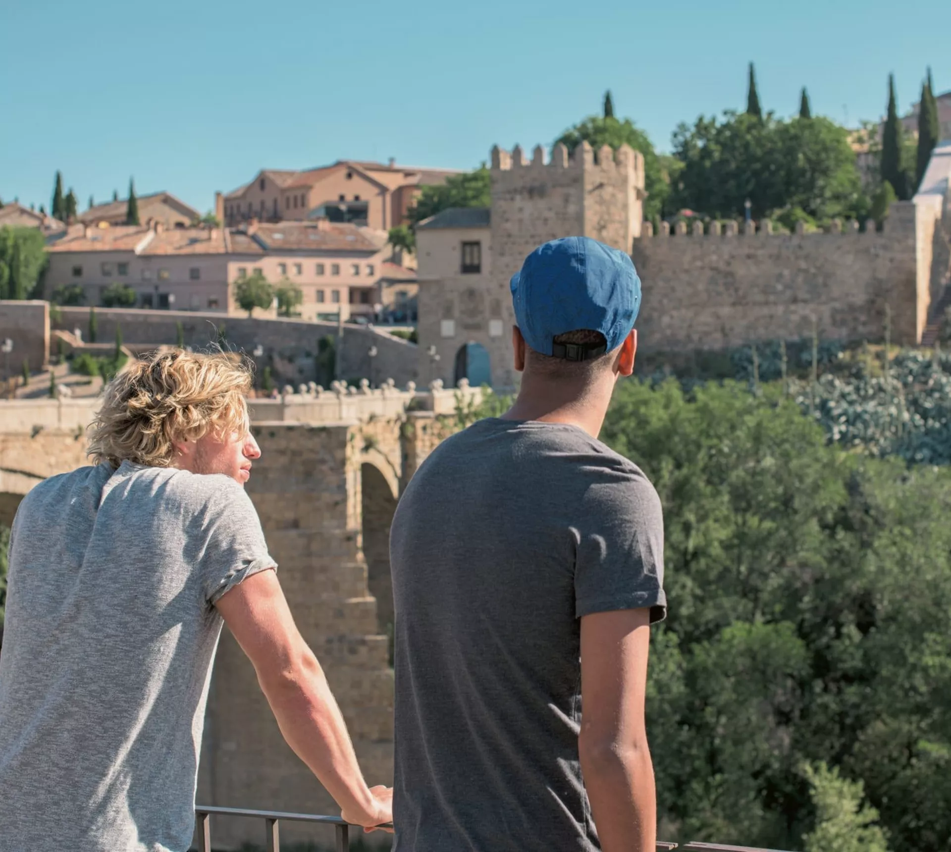 Two people enjoying views of Toledo's medieval old town - Contiki Madrid to Marrakesh Tour