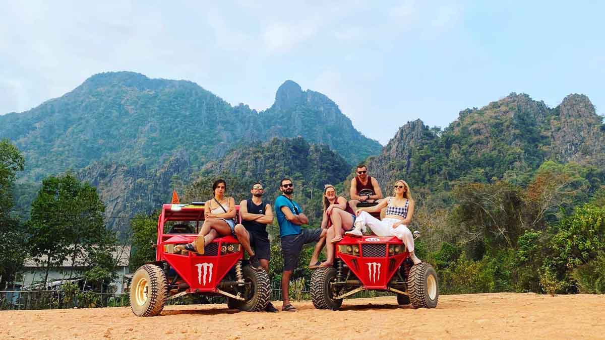 Tourists in Cambodia on quad bikes