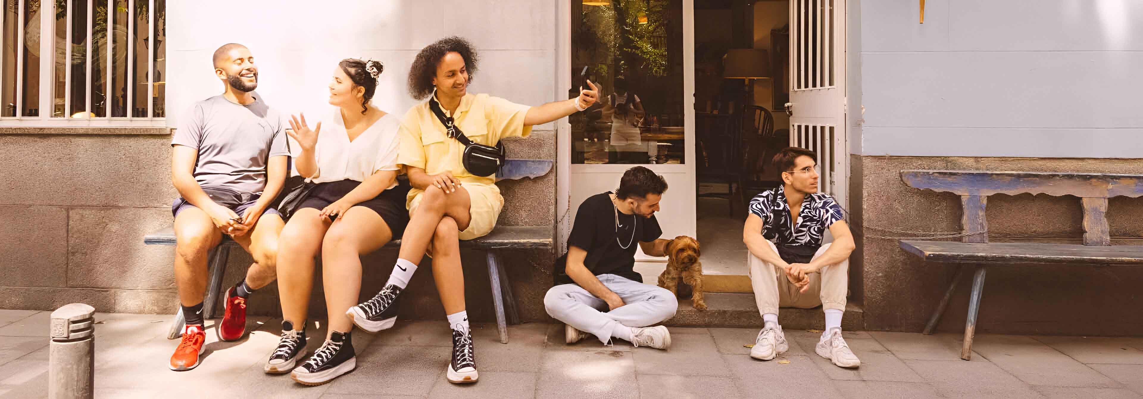 Groupd Of Friends Sitting And Taking A Selfie