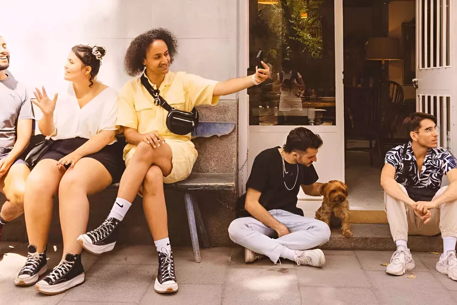 Groupd Of Friends Sitting And Taking A Selfie