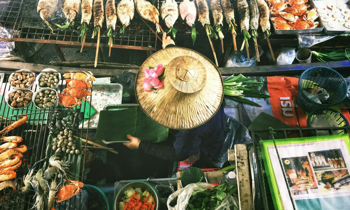Woman Serving Food In Thai Market
