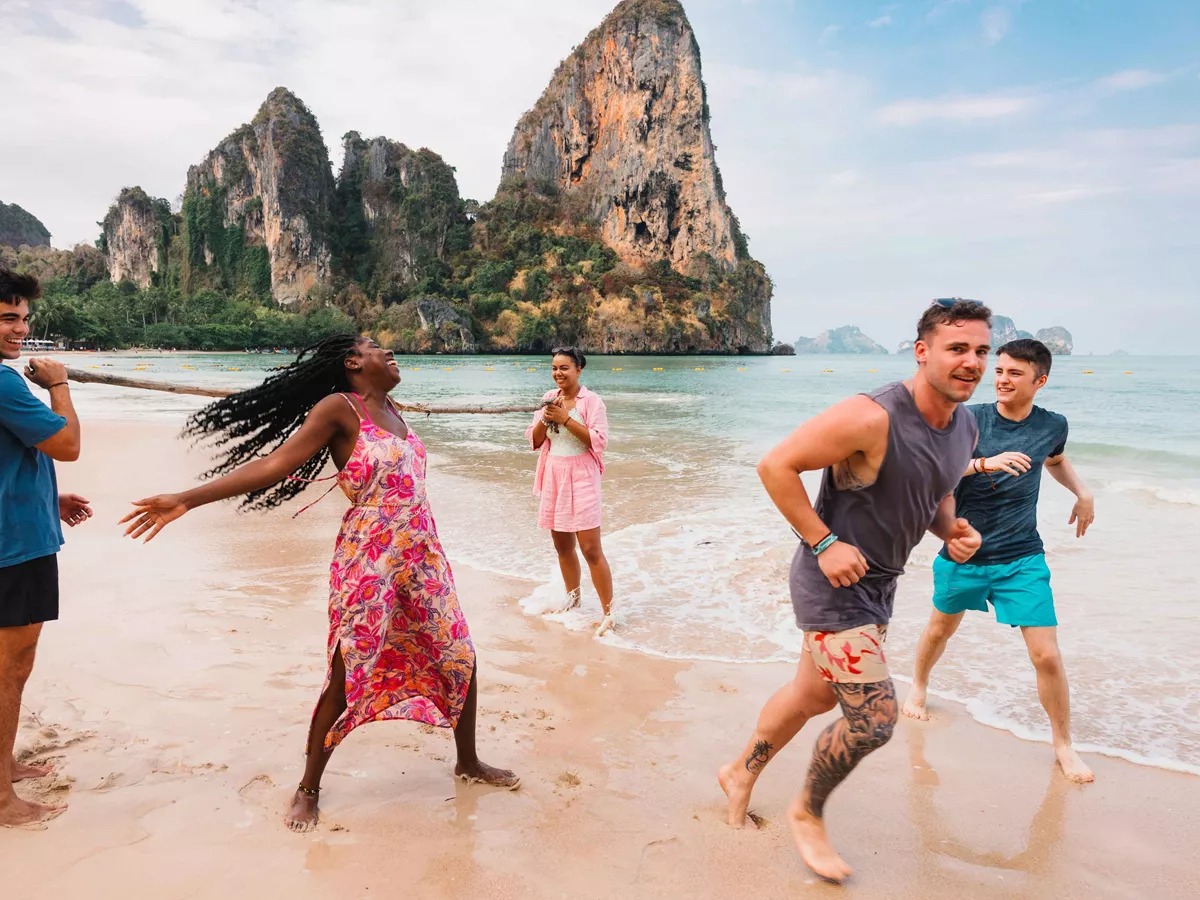 group-of-young-travelers-having-fun-beach-thailand.jpg